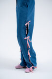 Denim trousers with bows